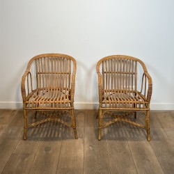 Pair of Rattan Armchairs with Wraparound Back, French Work | Maison Barrois