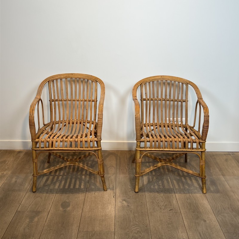 Pair of Rattan Armchairs with Wraparound Back, French Work | Maison Barrois
