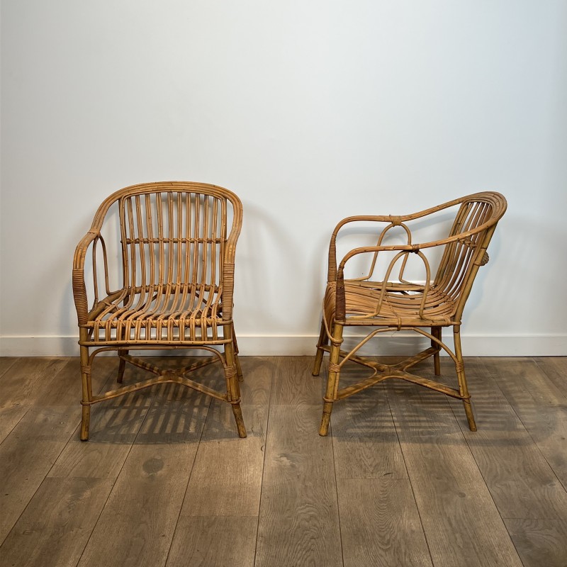 Pair of Rattan Armchairs with Wraparound Back, French Work | Maison Barrois