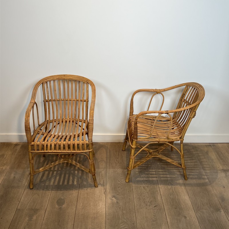Pair of Rattan Armchairs with Wraparound Back, French Work | Maison Barrois