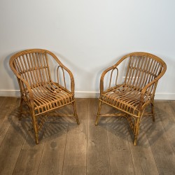 Pair of Rattan Armchairs with Wraparound Back, French Work | Maison Barrois