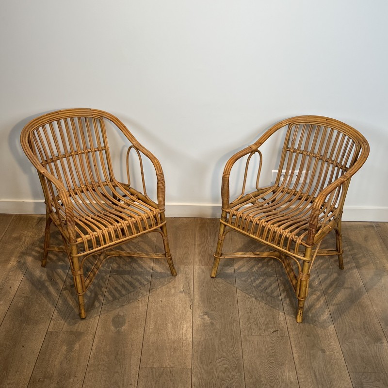 Pair of Rattan Armchairs with Wraparound Back, French Work | Maison Barrois