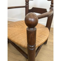 Stained Oak Armchair with Rush Seat and Turned Balls, Rustic Modern, French Work, Attributed to Charles Dudouyt, circa 1940