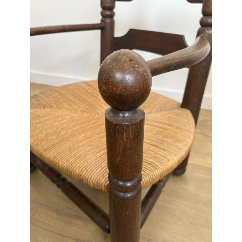 Stained Oak Armchair with Rush Seat and Turned Balls, Rustic Modern, French Work, Attributed to Charles Dudouyt, circa 1940