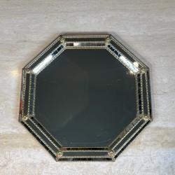 Octagonal Multi-Faceted Wall Mirror with Black Glass and Brass Garlands with Rosettes, Neoclassical, French Work, circa 1970