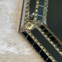Octagonal Multi-Faceted Wall Mirror with Black Glass and Brass Garlands with Rosettes, Neoclassical, French Work, circa 1970