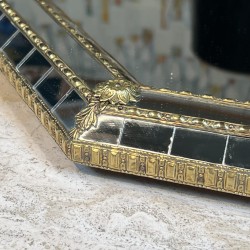Octagonal Multi-Faceted Wall Mirror with Black Glass and Brass Garlands with Rosettes, Neoclassical, French Work, circa 1970