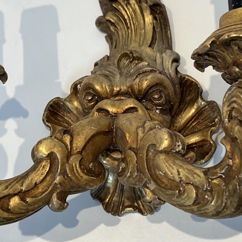 Pair of Sconces in Carved and Giltwood with a Mascaron and Acanthus Decoration, Two Lights, Régence, French Work, circa 1900
