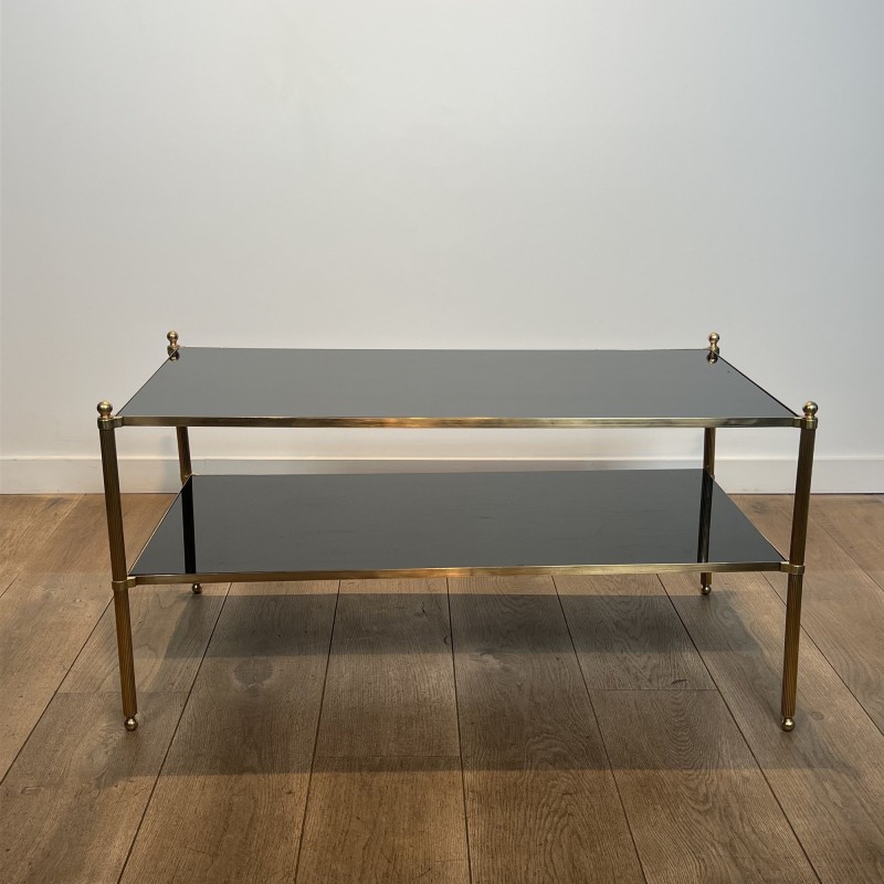 Rectangular Brass Coffee Table with Two Black Lacquered Glass Tiers, Fluted Uprights and Ball Feet, Maison Jansen, Circa 1960