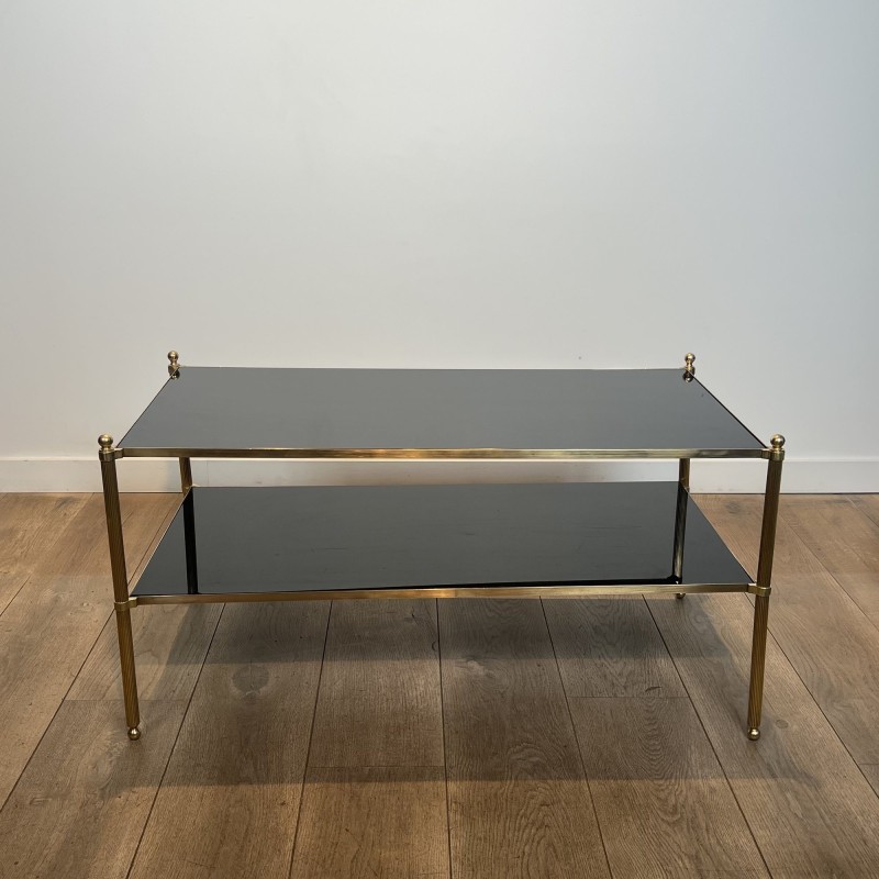 Rectangular Brass Coffee Table with Two Black Lacquered Glass Tiers, Fluted Uprights and Ball Feet, Maison Jansen, Circa 1960