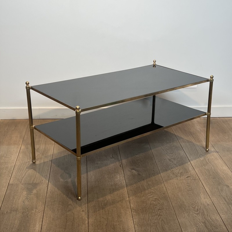Rectangular Brass Coffee Table with Two Black Lacquered Glass Tiers, Fluted Uprights and Ball Feet, Maison Jansen, Circa 1960