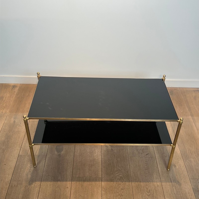 Rectangular Brass Coffee Table with Two Black Lacquered Glass Tiers, Fluted Uprights and Ball Feet, Maison Jansen, Circa 1960