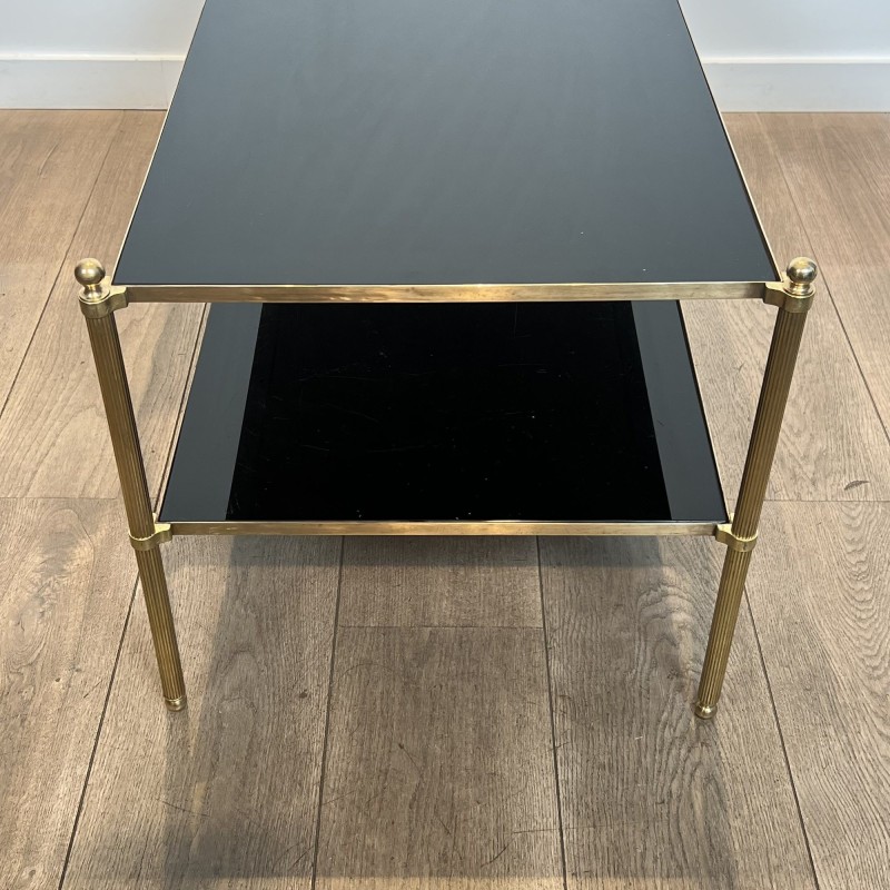 Rectangular Brass Coffee Table with Two Black Lacquered Glass Tiers, Fluted Uprights and Ball Feet, Maison Jansen, Circa 1960