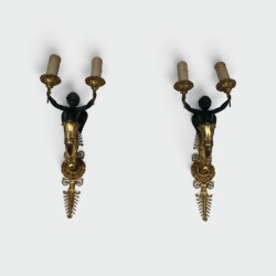 Pair of Empire Style Sconces with Two Light Arms in Gilt and Patinated Bronze Depicting a Winged Cupid, 19th Century