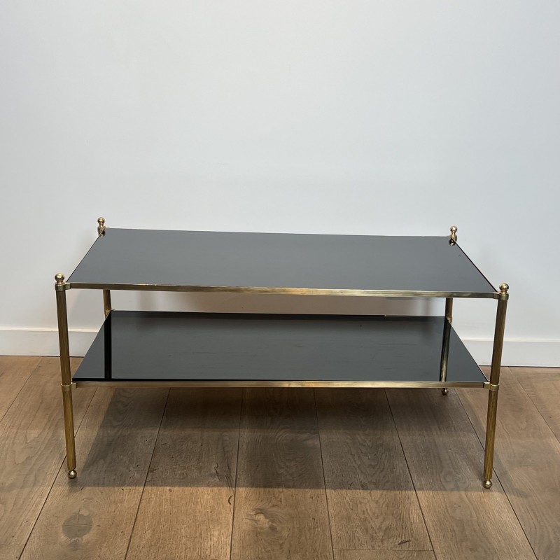Rectangular Brass Coffee Table with Two Black Lacquered Glass Tiers, Fluted Uprights and Ball Feet, Maison Jansen, Circa 1960