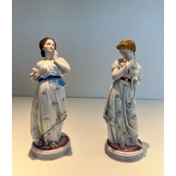 Pair of French Porcelain Figures of Women with Doves, circa 1880