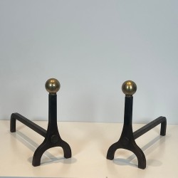 Pair of Modernist Steel and Brass Ball Finial Andirons by Jacques Adnet, French circa 1940